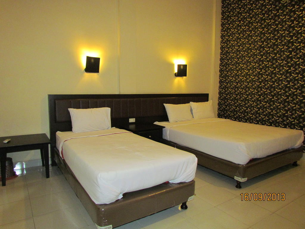 Hotel Carolina Transit Medan Habitación foto