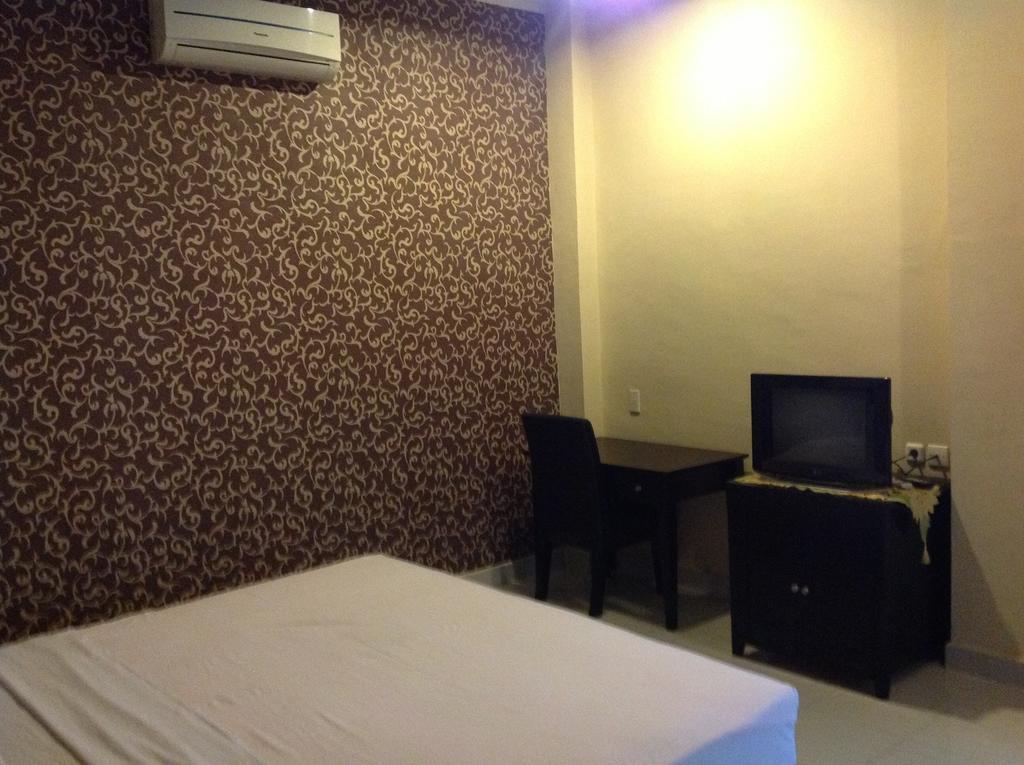 Hotel Carolina Transit Medan Habitación foto
